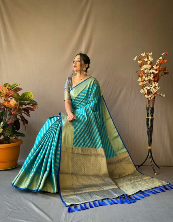 Rama green color kanchipuram silk saree with zari woven work