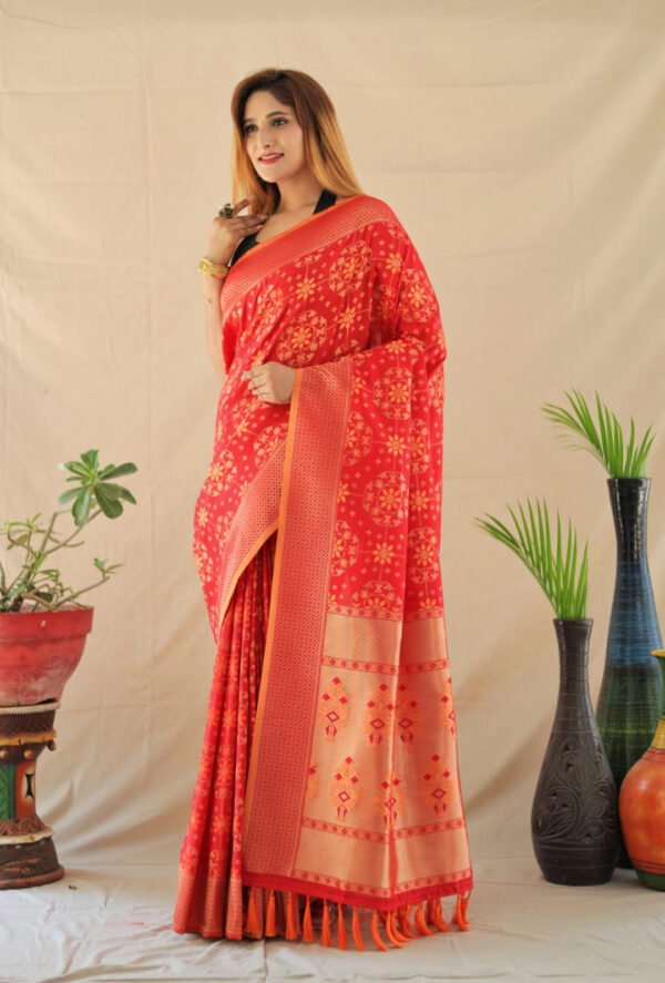 Red color patola silk saree with zari weaving work