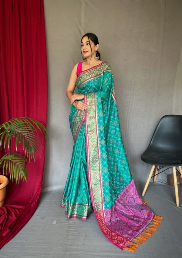 Green color patola silk saree with weaving work