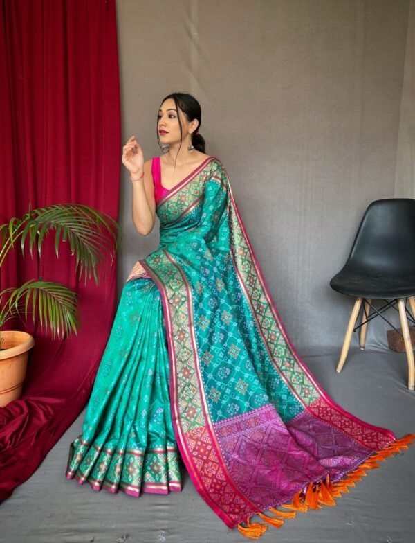 Green color patola silk saree with weaving work - Image 2