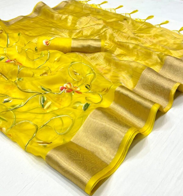 Yellow color soft organza silk saree with zari weaving work