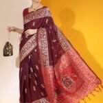 Magenta color soft raw silk saree with woven design