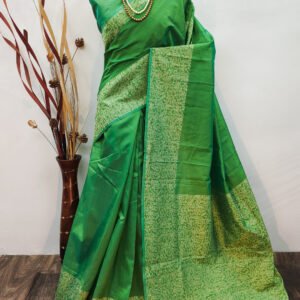 Parrot green color raw silk saree with woven design