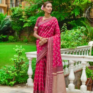 Pink color soft raw silk saree with woven design