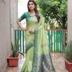 Pista green color dola silk saree with zari weaving work - Image 3