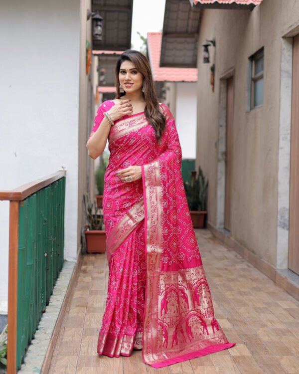 Rani pink color hand bandhej silk saree with printed work