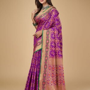 Purple color patola silk saree with zari weaving work
