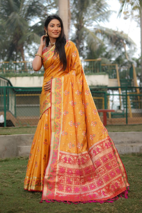 Yellow color soft organza silk saree with patola woven design - Image 4