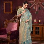 Sky blue organza silk saree with zari weaving work