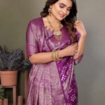 Magenta premium bandhej silk saree with zari weaving work