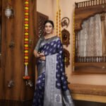 Navy blue color banarasi silk saree with zari weaving work