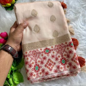 Off white handloom katan silk saree with ikkat printed border